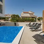 Compass; Luxury Experience In Natural Bay.
