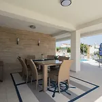 Compass; Luxury Experience In Natural Bay.